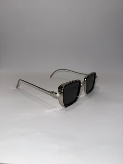 LENTES REVOLVER NEGROS PLATA
