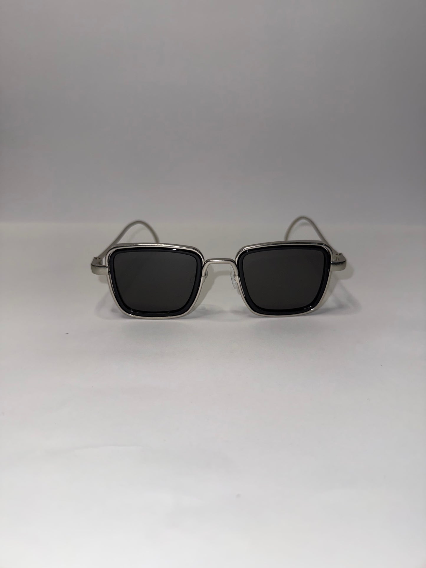 LENTES REVOLVER NEGROS PLATA